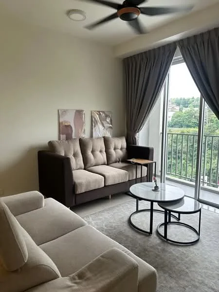 Living features: beige fabric 3-seater sofa, light grey fabric 2-seater sofa, round marble-top coffee table, black metal base for coffee table, floor-to-ceiling sliding glass door, curtains in light grey, wall-mounted artwork, light ceiling fan with wooden blades, carpeted flooring, greenery view from window; style: modern; view: garden.