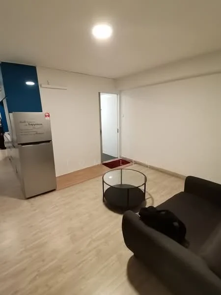 Living features: laminate flooring, white painted walls, recessed downlights, sofa in black fabric, round glass coffee table, stainless-steel fridge, door leading to hallway; style: modern.
