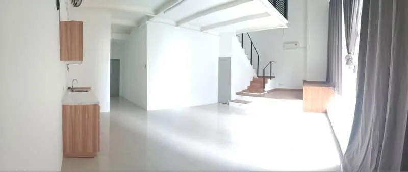 Living features: white painted walls, polished tile flooring, large windows with sheer curtains, staircase with wooden steps, built-in cabinetry with wood finish, ceiling with exposed beams, air conditioning unit, natural light from large window; style: modern. Room features: white painted walls, polished tile flooring.