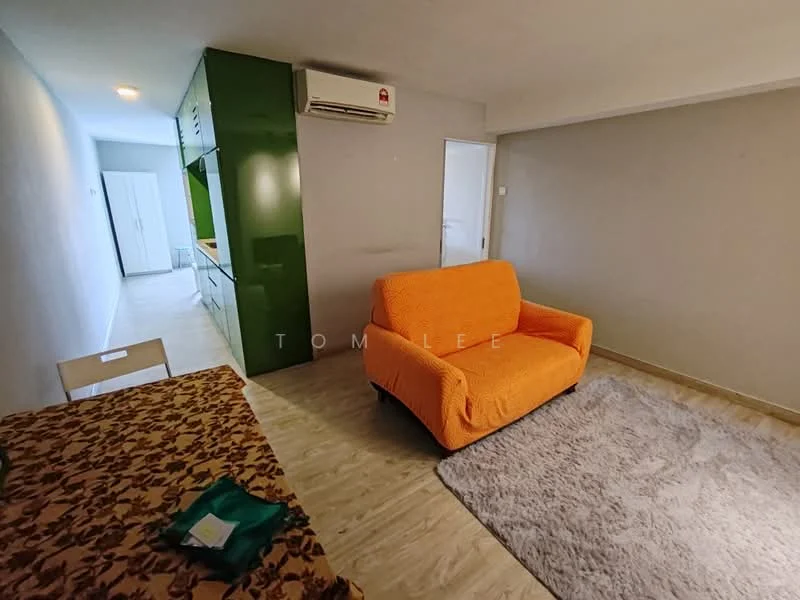 Living features: orange fabric sofa, area rug with neutral color, wall-mounted split AC, light-colored laminate flooring, grey painted walls, dining table with floral tablecloth, open layout to kitchen, recessed ceiling lights; style: modern.