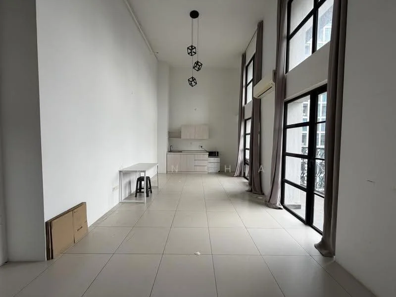Living features: high ceiling, large floor-to-ceiling windows, white painted walls, light grey tiled flooring, modern pendant lighting, open layout, kitchenette with cabinets, air conditioning unit, curtains, minimalist decor; style: modern.