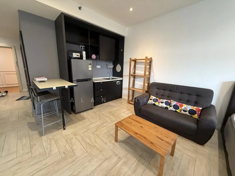 Living features: grey fabric sofa, wood coffee table, black cabinetry, stainless-steel fridge, built-in countertop, bar stools, light wood flooring, wall-mounted shelves; style: modern.
