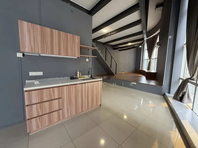 Kitchen features: wooden cabinetry with laminate finish, white countertop, single-bowl stainless-steel sink, chrome pull-down faucet, tile flooring, grey painted walls, exposed beams on ceiling, recessed downlights; style: modern. Living features: wooden platform area, large windows with sheer curtains, grey painted walls, exposed beams on ceiling, tile flooring, recessed downlights; style: modern.