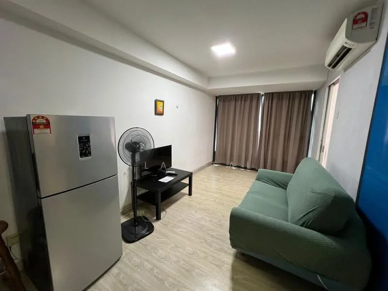 Living features: green fabric sofa, black coffee table, wall-mounted TV, stainless-steel fridge, standing fan, laminate flooring, white painted walls, curtains in brown, recessed ceiling lights, air conditioning unit; style: modern.