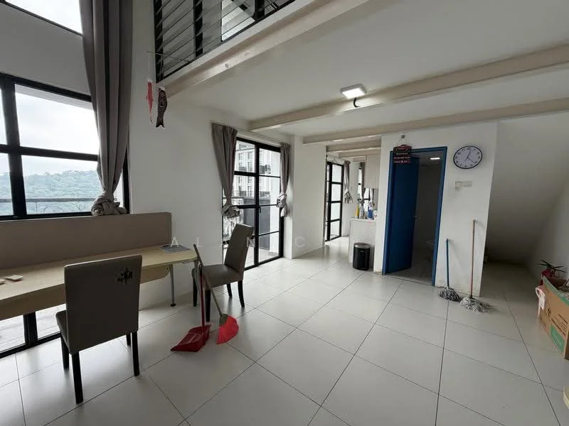 Room features: large windows with black frames, white painted walls, grey tiled flooring, ceiling with exposed beams, dining table with two chairs, blue door, wall clock, cleaning supplies visible, curtains on windows, open layout, light fixture on ceiling; style: modern; view: mountain.