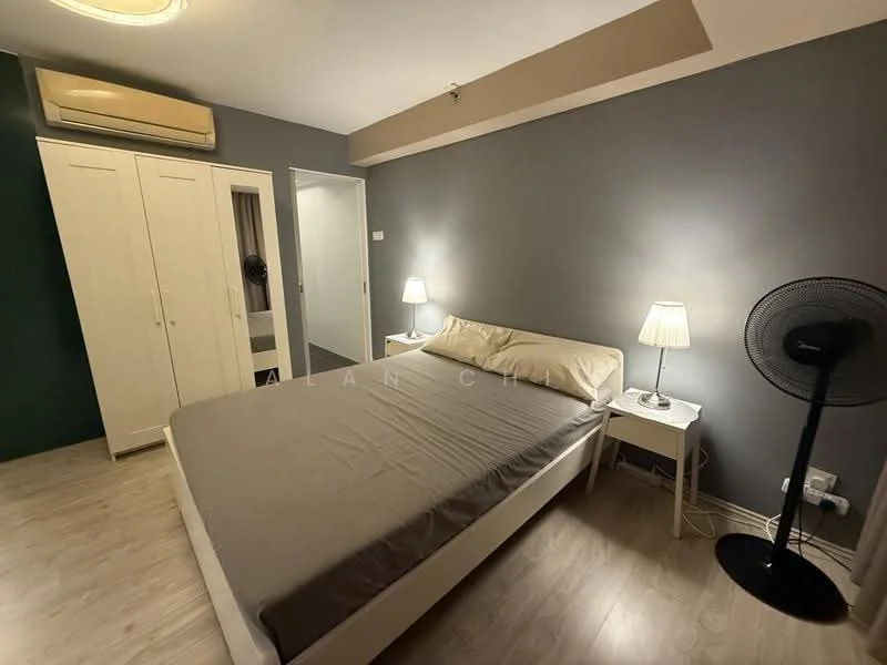 Bedroom features: queen-size bed with grey bedding, white bedside tables, table lamps on either side of the bed, built-in wardrobe with sliding doors, light wood flooring, grey painted walls, ceiling fan, wall-mounted air conditioning unit, doorway leading to another room; style: modern.