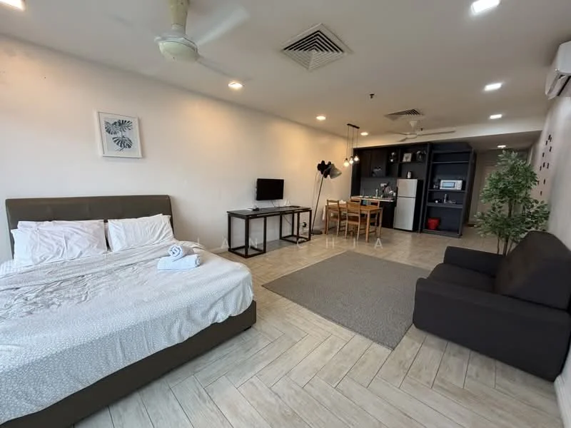 Living features: queen-size bed with white bedding, sofa in dark grey fabric, wooden dining table for four, black refrigerator, built-in kitchen cabinetry, microwave, television on stand, ceiling fan, light-colored tiled flooring, decorative plant in pot, wall-mounted shelving, wall art with floral design; style: modern.