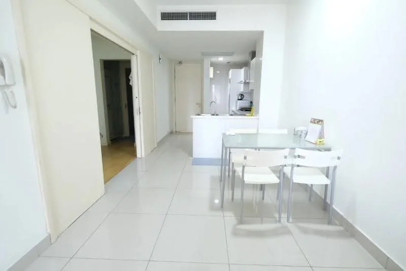 Dining features: white walls, glossy ceramic tile flooring, glass dining table, 4 white plastic dining chairs, open layout, kitchen island with seating, recessed downlights, doorway leading to hallway, doorway leading to kitchen, neutral decor; style: modern. Room features: white walls, glossy ceramic tile flooring, open layout, doorway leading to hallway, doorway leading to kitchen.
