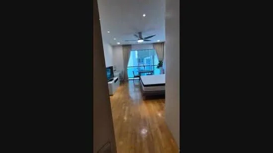 Bedroom features: wooden flooring, 5-blade ceiling fan with light, floor-to-ceiling windows, sheer curtains, balcony access, TV console, wall-mounted TV, decorative plant, unmade bed with mattress, neutral wall color, recessed downlights; style: modern; view: city.