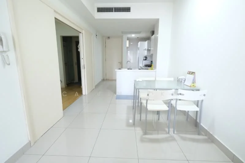 Dining features: white walls, glossy tile flooring, 4-seater dining table with transparent chairs, open layout to kitchen, recessed lighting, kitchen island, visible kitchen appliances, neutral decor; style: modern. Room features: white walls, glossy tile flooring, doorway leading to hallway, doorway leading to another room.