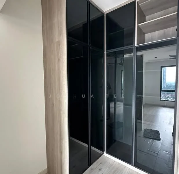 Room features: black glass wardrobe, wood paneling, light-colored flooring, large window with city view, ceiling fan, built-in shelving, neutral wall color; style: modern; view: city.