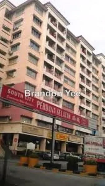 Exterior type: mid-rise condominium; features: pink painted facade, multiple balconies, commercial units at ground level, signage visible, parking area in front, surrounded by urban context; style: modern.
