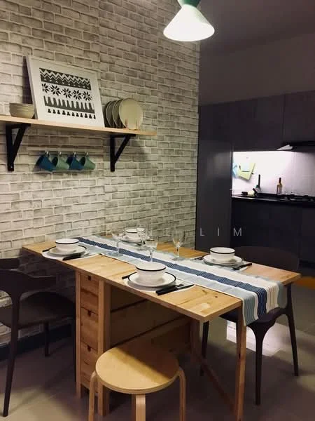 Dining features: wooden dining table, 4 dining chairs, white plates, glassware, blue and white table runner, shelf with decorative plates, brick accent wall, pendant light fixture; style: modern. Kitchen features: grey cabinetry, stainless-steel appliances, kitchen countertop, cooking utensils visible; style: modern.