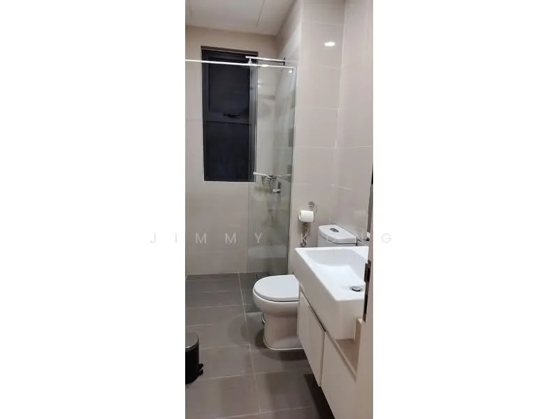 Bathroom features: white tiled walls, grey ceramic tile flooring, walk-in shower with glass enclosure, chrome handheld shower, single-sink vanity with white cabinet, chrome basin mixer faucet, framed mirror, one-piece toilet, toilet paper holder, window for natural light; style: modern.