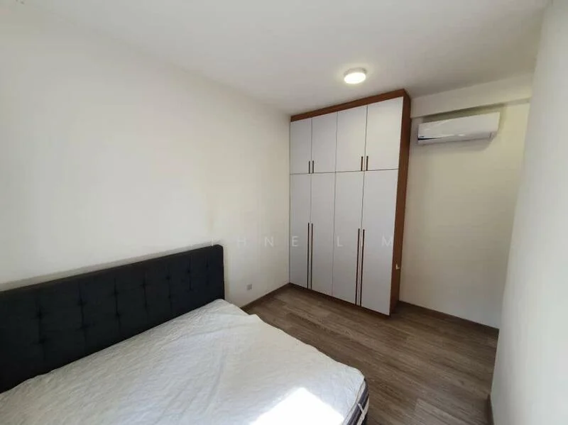 Bedroom features: queen-size bed, upholstered headboard, built-in wardrobe with white and wood finish, wall-mounted air conditioning unit, recessed ceiling light, wood laminate flooring, white painted walls; style: modern.