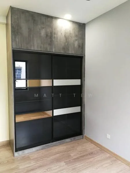 Room features: grey accent wall, wooden flooring, built-in wardrobe with sliding doors, black glass sliding doors with silver accents, recessed downlights, window with black frame, light-colored wall, laminate wood finish; style: modern.