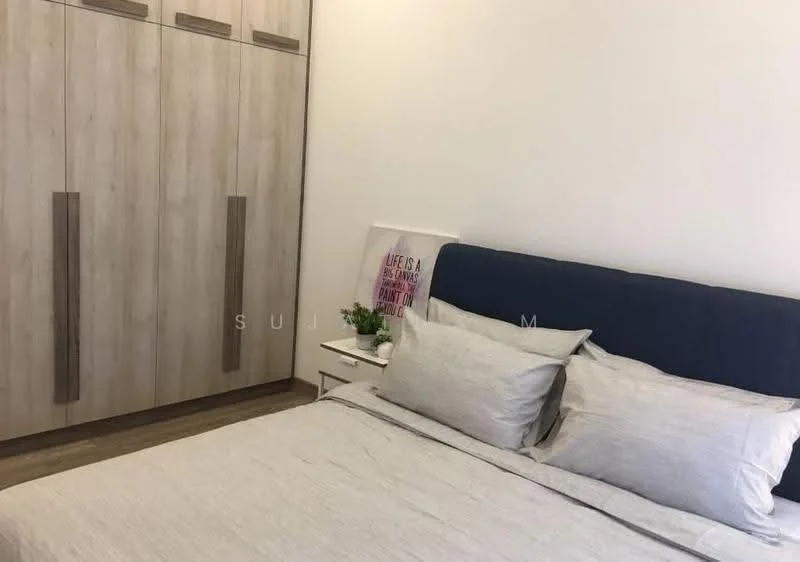 Bedroom features: king-size bed with grey bedding, upholstered headboard in navy blue, built-in wardrobe with wood finish, nightstand with decorative plant, framed artwork on wall, wooden flooring, white painted walls, soft lighting; style: modern.