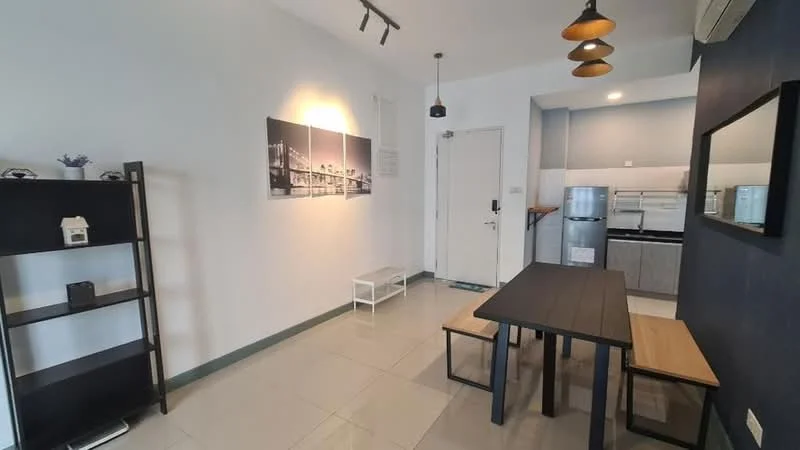 Dining features: dining table with two wooden benches, black painted walls, white painted walls, recessed downlights, pendant lights, framed artwork on walls, ceramic tile flooring, open shelving unit, door to kitchen area, stainless-steel fridge; style: modern.