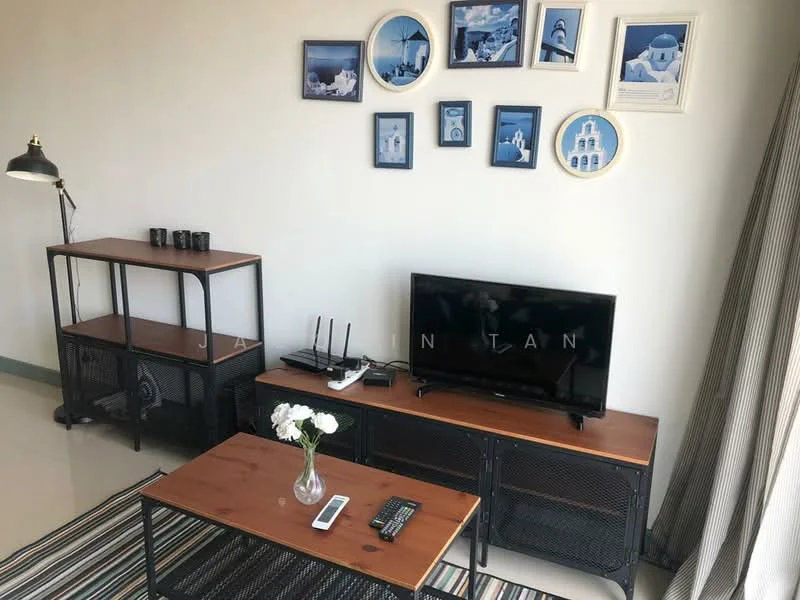 Living features: wooden coffee table, black metal TV console, wall-mounted TV, decorative wall art with blue frames, black floor lamp, wireless router, area rug with geometric pattern, curtains, shelves with decorative items, remote control; style: modern.