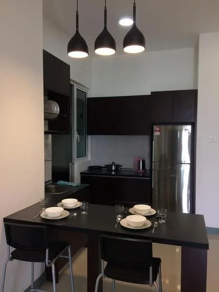 Kitchen features: black countertop, dark wood cabinetry, stainless-steel fridge, built-in stove, kitchen sink, pendant lighting, window with view, dining table for two, four dining plates, cutlery set, kettle, glassware; style: modern.