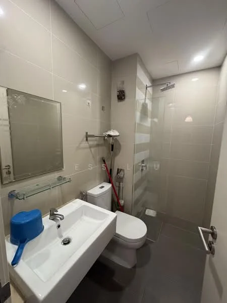 Bathroom features: white ceramic sink, chrome basin mixer faucet, one-piece toilet, walk-in shower with glass enclosure, rain shower head, framed mirror, grey tiled walls, dark grey floor tiles, glass shower partition, towel rack, shower shelf; style: modern.