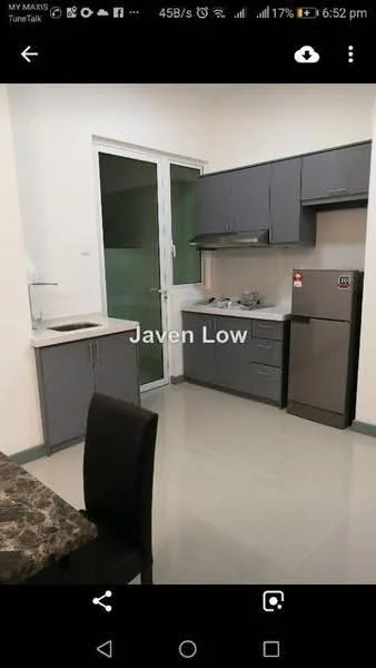 Kitchen features: grey cabinetry, white countertop, single-bowl stainless-steel sink, chrome pull-down faucet, built-in stove, stainless-steel fridge, ceramic tile flooring, window with view to outside, dining table with marble top, black dining chairs; style: modern.