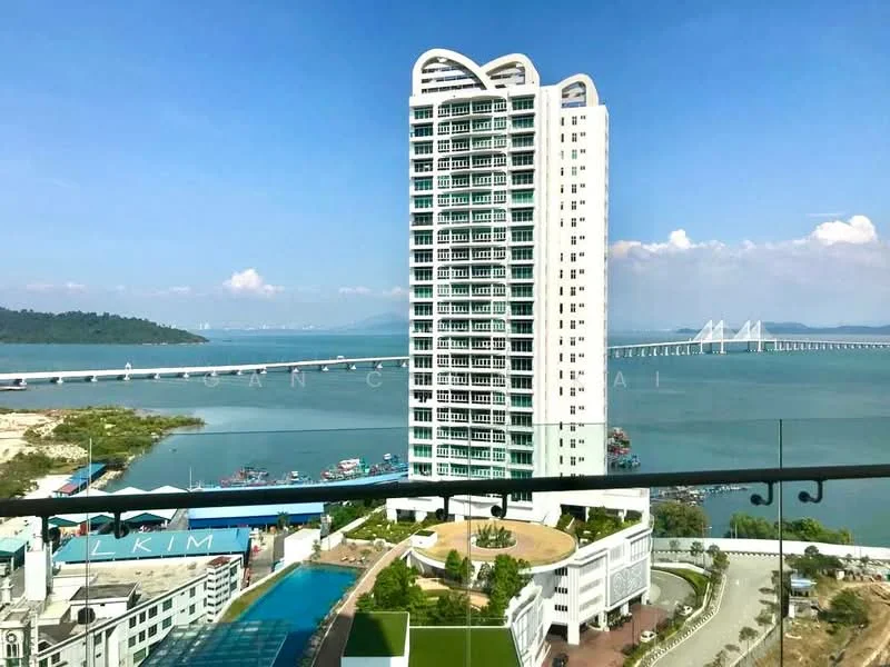 Exterior type: high-rise condominium; features: glass curtain wall, white painted facade, recessed balconies, surrounded by water, view of bridge, landscaped garden at base, swimming pool visible, urban context with waterfront, multiple storeys, modern architectural design; style: modern.