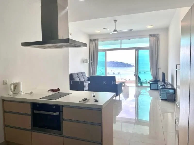 Living features: floor-to-ceiling windows, sliding glass door, sea view, grey fabric sofa, coffee table, TV console, wall-mounted TV, recessed downlights, ceiling fan, marble tile flooring, curtains, open-plan layout with kitchen, decorative wall art; style: modern; view: sea. Kitchen features: kitchen island, built-in oven, stainless-steel range hood, ceramic cooktop, drawer cabinets, countertop with storage, white cabinetry, under-cabinet lighting; style: modern.