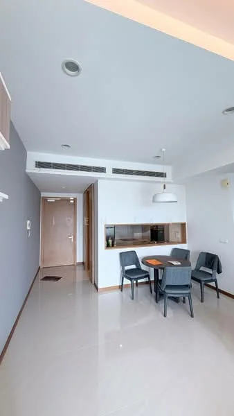 Dining features: grey painted walls, white ceiling, recessed downlights, floor-to-ceiling windows, dining table, 4 dining chairs, built-in wall shelf, glossy tile flooring, open layout, view of hallway; style: modern. Room features: entrance door, air conditioning vents.