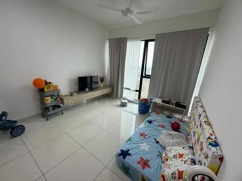 Room features: white painted walls, glossy white tile flooring, ceiling fan, floor-to-ceiling windows, sheer curtains, TV on wall-mounted console, wooden TV console, colorful patterned sofa bed, blue bedspread with cartoon characters, plastic laundry basket, toy tricycle, decorative items on console; style: modern; view: city.
