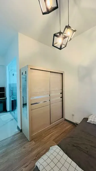 Bedroom features: wooden flooring, white painted walls, sliding wardrobe with glass panels, 3-blade ceiling fan with light, bed with brown bedding, decorative wall light, window with sheer curtains; style: modern.