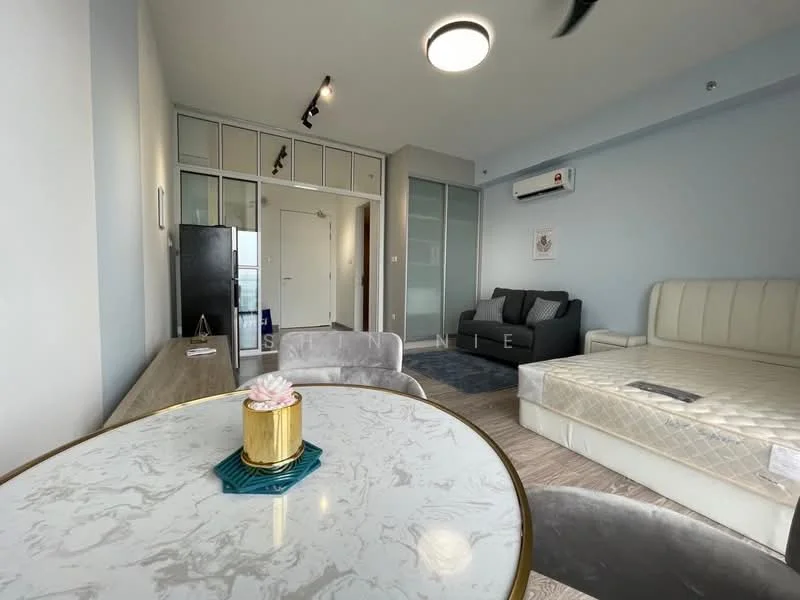 Living features: grey fabric sofa, queen-size bed with mattress, round dining table with marble top, 4 dining chairs, wall-mounted air conditioning unit, light fixture on ceiling, wooden flooring, neutral painted walls, sliding glass door, decorative plant on table; style: modern. Room features: white painted walls, doorway leading to hallway, black refrigerator, glass panel closet.