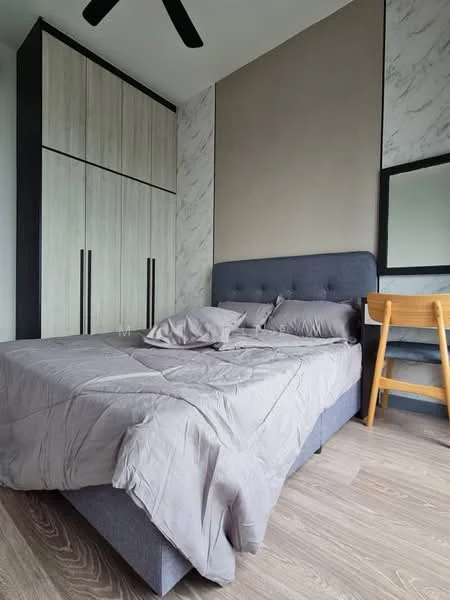 Bedroom features: queen-size bed with grey bedding, upholstered headboard, built-in wardrobe with wood finish, grey accent wall, wooden flooring, ceiling fan, mirror on wall, wooden study desk, wooden chair; style: modern.