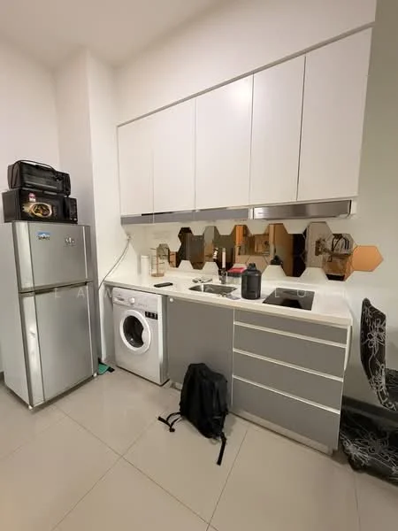 Kitchen features: stainless-steel fridge, front-load washing machine, white upper cabinets, grey lower cabinets, white countertop, single-bowl stainless-steel sink, chrome pull-down faucet, hexagonal mirror backsplash, tile flooring, black chair, black backpack; style: modern.