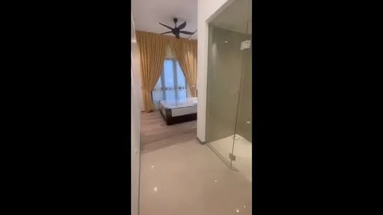 Room features: floor-to-ceiling windows, sheer curtains, 5-blade ceiling fan, wooden flooring, cream painted walls, glass shower enclosure, white tiled flooring, bed with headboard; style: modern; view: city.