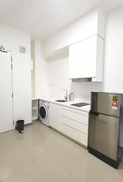 Kitchen features: white cabinetry, single-bowl stainless-steel sink, chrome pull-down faucet, built-in stove, built-in oven, stainless-steel fridge, front-load washing machine, countertop with storage, tile flooring, white walls, recessed downlights; style: modern.