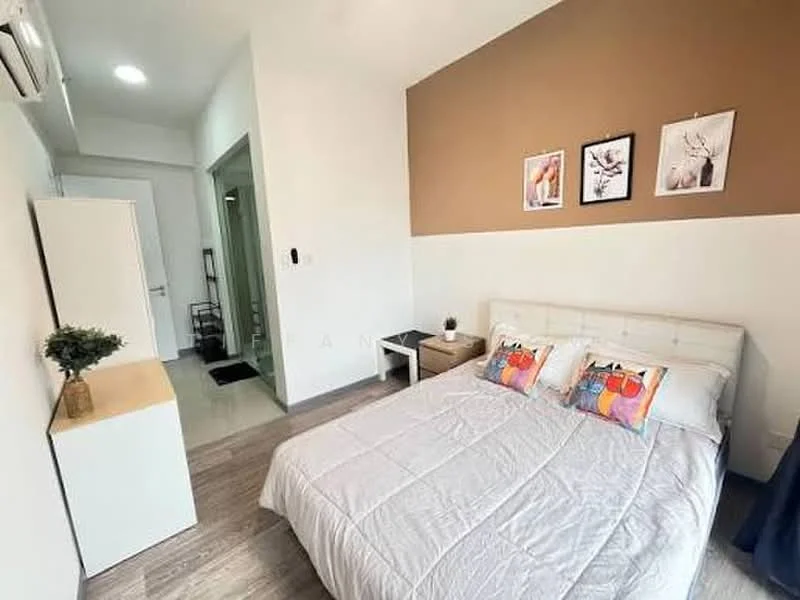 Bedroom features: queen-size bed with white bedding, upholstered headboard, two decorative pillows with colorful patterns, wooden bedside table, framed artwork on walls, light-colored walls with a brown accent wall, laminate flooring, wall-mounted air conditioning unit, desk with chair, built-in wardrobe, natural light from window; style: modern.
