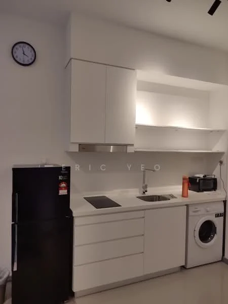 Kitchen features: white cabinetry, black fridge, stainless-steel sink, chrome pull-down faucet, white countertop, built-in oven, microwave, front-load washing machine, wall clock, under-cabinet lighting; style: modern.