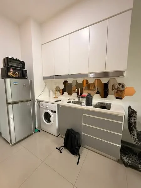 Kitchen features: stainless-steel fridge, front-load washing machine, single-bowl stainless-steel sink, chrome pull-down faucet, white cabinetry with flat-panel design, grey lower cabinets, hexagonal mirror backsplash, countertop with smooth surface, tile flooring, black chair with decorative pattern; style: modern.