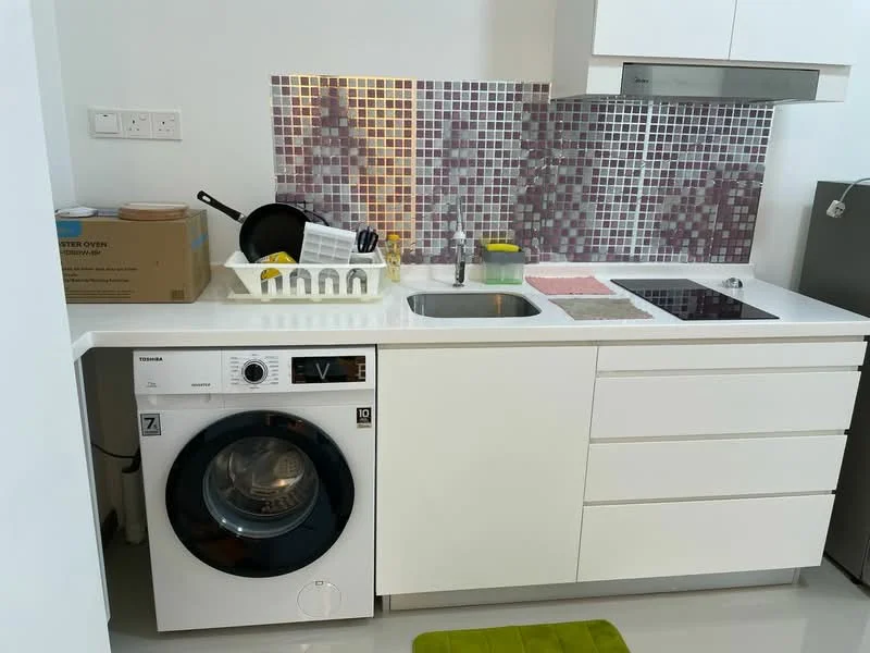 Kitchen features: white cabinetry, stainless-steel sink, chrome pull-down faucet, ceramic tile backsplash with mosaic pattern, built-in electric cooktop, front-load washing machine, countertop with space for appliances, green area rug, box for oven, dish rack, utensils holder; style: modern.