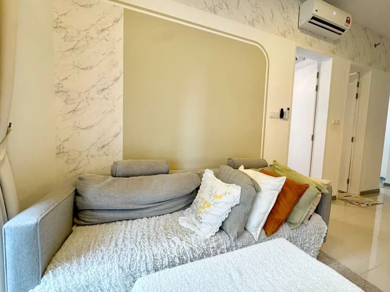 Living features: light grey fabric sofa, decorative cushions in various colors, textured white throw blanket, marble accent wall, cream painted wall, recessed lighting, wall-mounted air conditioning unit, glossy tile flooring; style: modern.