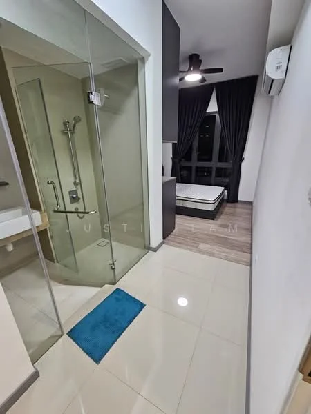 Bathroom features: glass shower enclosure, rain shower head, handheld shower, white sink with wooden vanity, chrome basin mixer, tile flooring, white walls, mirror above sink, blue bath mat; style: modern. Bedroom features: queen-size bed, black headboard, floor-to-ceiling windows, black curtains, wood laminate flooring, wall-mounted air conditioning unit, light fixture with fan; style: modern.