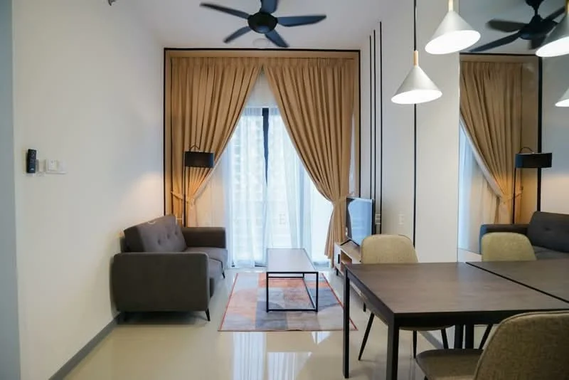 Living features: grey fabric sofa, coffee table, area rug with geometric pattern, dining table, upholstered dining chairs, floor-to-ceiling windows, sheer curtains, blackout curtains, ceiling fan with light, wall-mounted TV, decorative mirror, wall sconce; style: modern.