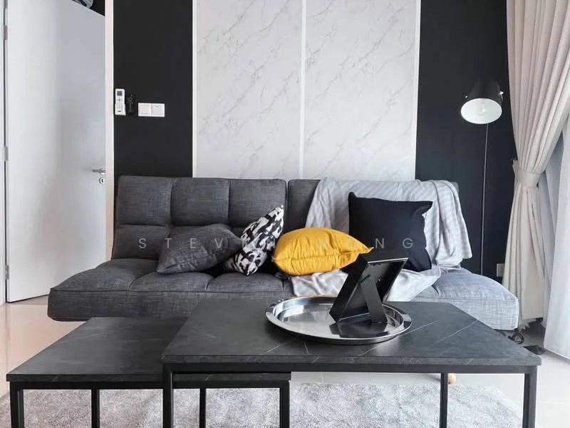 Living features: grey fabric sofa, black accent wall, white marble feature wall, black coffee table, metal frame coffee table, decorative throw pillows in black and yellow, floor lamp, curtains, light-colored flooring, wall-mounted artwork, tray on coffee table; style: modern.