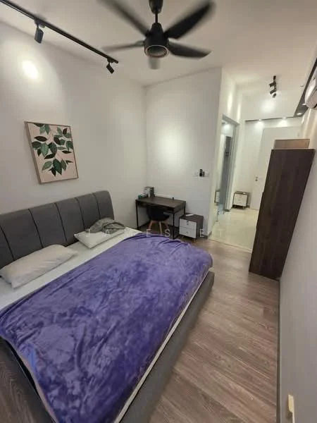 Bedroom features: queen-size bed with grey upholstered headboard, purple blanket, wooden flooring, wall-mounted ceiling fan, framed artwork with leaf design, desk with chair, built-in wardrobe, wall-mounted air conditioning unit, recessed lighting, neutral painted walls; style: modern.
