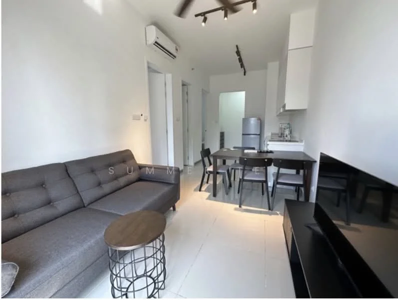 Living features: grey fabric L-shape sectional sofa, round black metal coffee table, wall-mounted TV, black TV console, white painted walls, recessed LED downlights, 1 wall-mounted split AC, ceramic tile flooring, dining table with 4 chairs, stainless-steel fridge, kitchen cabinetry, open layout to kitchen; style: modern.