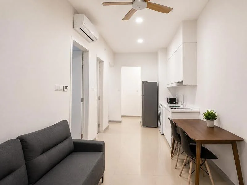 Living features: 3-seater fabric sofa in grey, wood dining table for 4, black dining chairs, refrigerator, built-in kitchen cabinets in white, stainless-steel sink, freestanding washing machine, wall-mounted split AC, ceiling fan with 5 blades, recessed LED downlights, cream tiled flooring, white painted walls; style: modern.