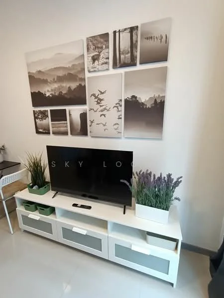 Living features: white wall, grey tiled flooring, flat-panel white TV console, black flat-screen TV, decorative wall art with nature themes, green potted plants, open shelving, drawers in TV console; style: modern.