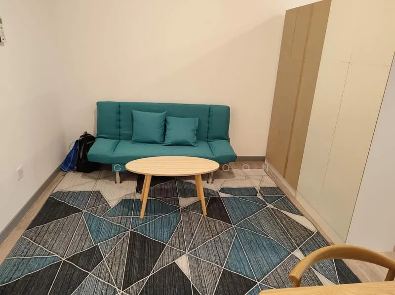 Living features: teal fabric sofa, 2 square cushions in teal, round wooden coffee table, area rug with geometric pattern in blue and grey, light wood flooring, white painted walls, built-in wardrobe with light wood finish; style: modern.