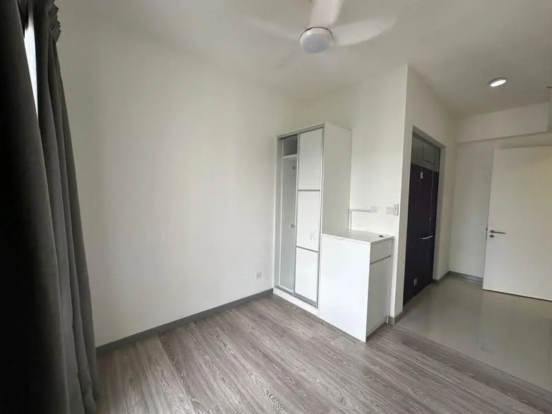 Room features: white painted walls, laminate flooring, ceiling fan, built-in wardrobe, window with grey curtains, door to hallway, light fixture in ceiling, neutral color scheme; style: modern.